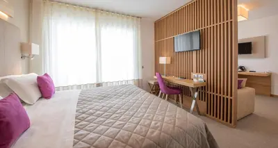 Letto o letti in una camera di Hotel Le Soleil