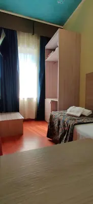 Letto o letti in una camera di Hotel Ducale