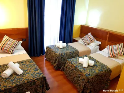 Letto o letti in una camera di Hotel Ducale