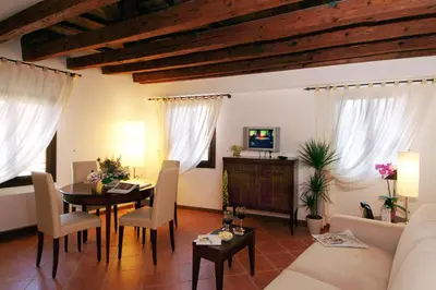 TV o dispositivi per l'intrattenimento presso Residence Corte Grimani