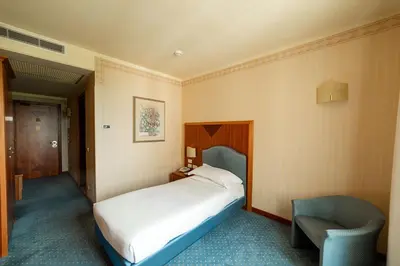 Letto o letti in una camera di Phi Hotel Astoria