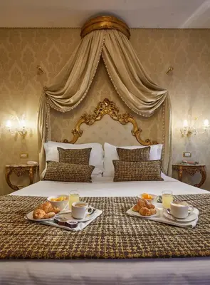 Letto o letti in una camera di Hotel Orsaria