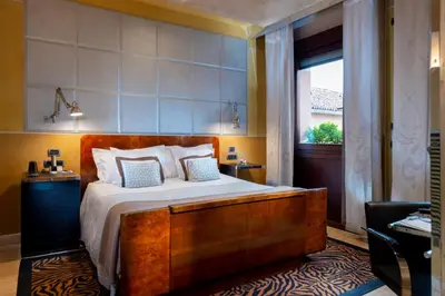 Letto o letti in una camera di Ca' Pisani Hotel