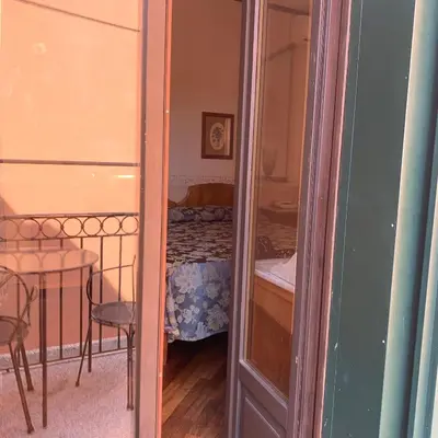Letto o letti in una camera di Hotel La Calcina