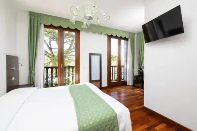 Letto o letti in una camera di Hotel Villa Cipro