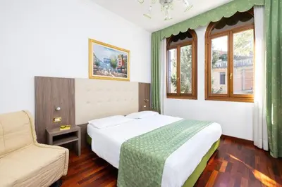 Letto o letti in una camera di Hotel Villa Cipro