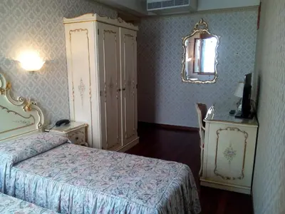Letto o letti in una camera di Hotel Diana