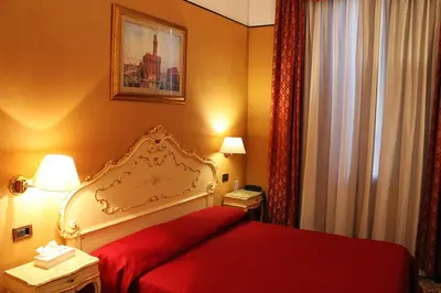 Letto o letti in una camera di Locanda Poste Vecie