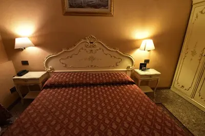 Letto o letti in una camera di Locanda Poste Vecie