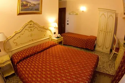 Letto o letti in una camera di Locanda Poste Vecie