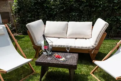 Area soggiorno di Villa Gallo 1915, luxurious villa with garden and SPA