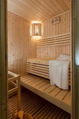 Letto o letti in una camera di Villa Gallo 1915, luxurious villa with garden and SPA
