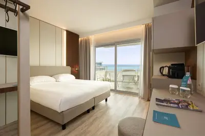 Letto o letti in una camera di Adriatic Palace Hotel