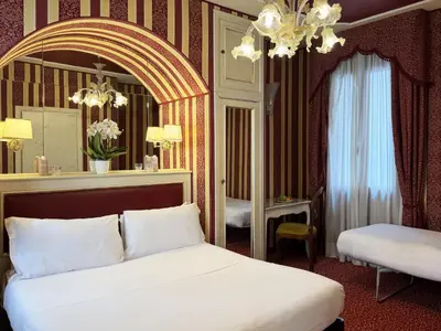 Letto o letti in una camera di Hotel Alcyone