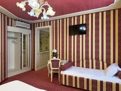 Letto o letti in una camera di Hotel Alcyone