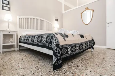 Letto o letti in una camera di Appartamento Ai Greci Residenza Quaggio