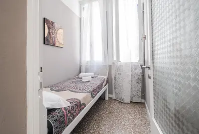Letto o letti in una camera di Appartamento Ai Greci Residenza Quaggio