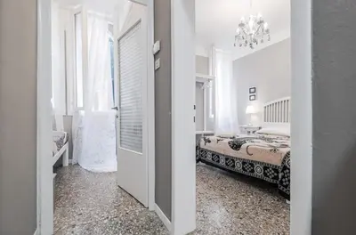 Letto o letti in una camera di Appartamento Ai Greci Residenza Quaggio