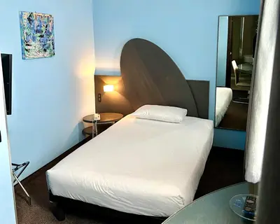 Letto o letti in una camera di Hotel Ambra