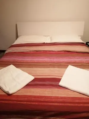 Letto o letti in una camera di Golden Heart
