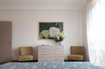 Letto o letti in una camera di PadovaResidence Apartments - vicino Cappella degli Scrovegni, Ospedale e Università