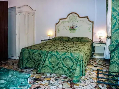 Letto o letti in una camera di Smeraldo apartment Grand Canal 1566C