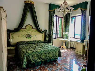 Letto o letti in una camera di Smeraldo apartment Grand Canal 1566C