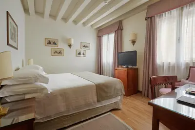 Letto o letti in una camera di Hotel Villa Cipriani