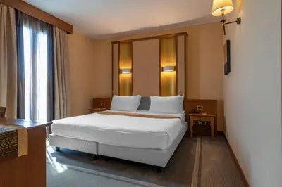 Letto o letti in una camera di Thai Si Royal Thai Spa