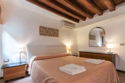 Letto o letti in una camera di Emmalu
