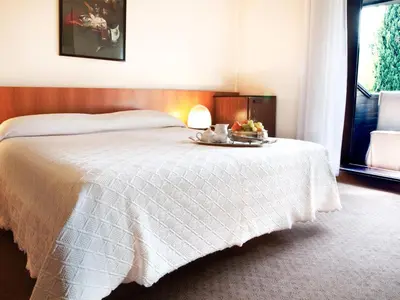 Letto o letti in una camera di Hotel Due Mori