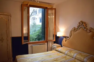 Letto o letti in una camera di Albergo Basilea
