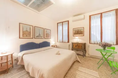 Letto o letti in una camera di Canal Grande Suite