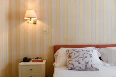Letto o letti in una camera di Hotel Continental