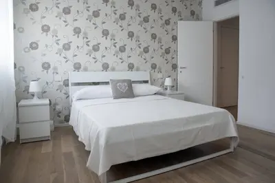 Letto o letti in una camera di Appartamenti Scrovegni