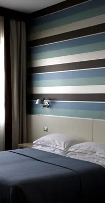 Letto o letti in una camera di Key Hotel