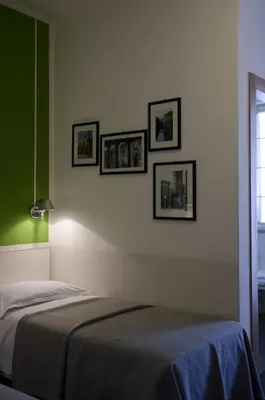 Letto o letti in una camera di Key Hotel