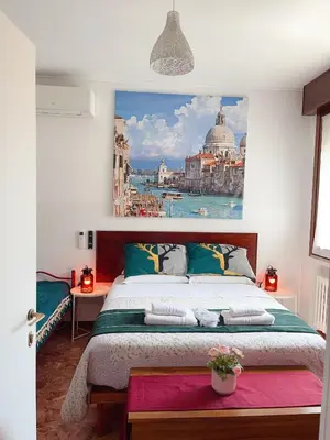 Letto o letti in una camera di Sogna Venezia