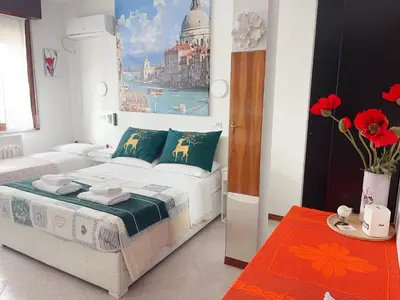 Letto o letti in una camera di Sogna Venezia
