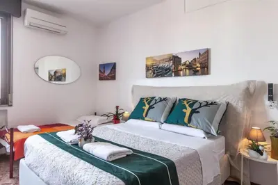 Letto o letti in una camera di Sogna Venezia