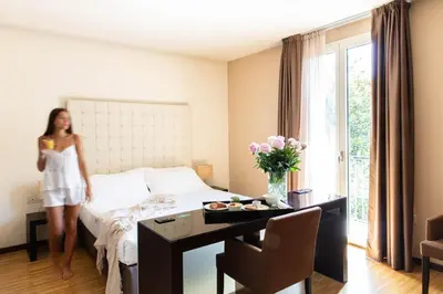 Letto o letti in una camera di Sweet Hotel