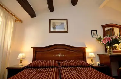 Letto o letti in una camera di Hotel Orion