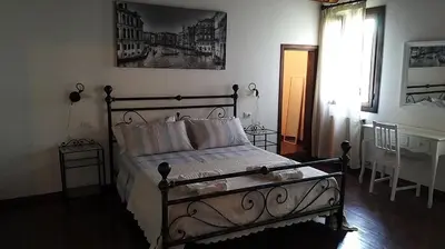 Letto o letti in una camera di B&B Villa Trotter