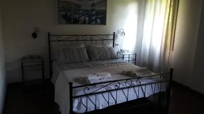 Letto o letti in una camera di B&B Villa Trotter