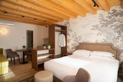 Letto o letti in una camera di Relais La Dolce Vite