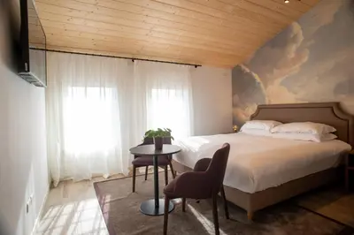 Letto o letti in una camera di Relais La Dolce Vite