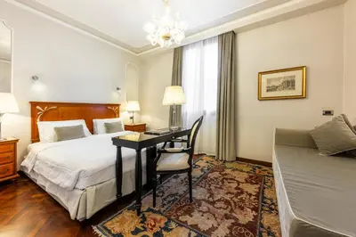Letto o letti in una camera di Hotel Casa Verardo Residenza d'Epoca