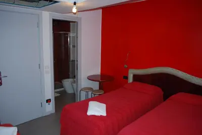 Letto o letti in una camera di Hotel San Geremia