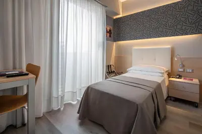Letto o letti in una camera di Hotel Rosanna 3 Stelle Superior