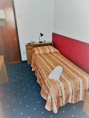 Letto o letti in una camera di Hotel Kristall